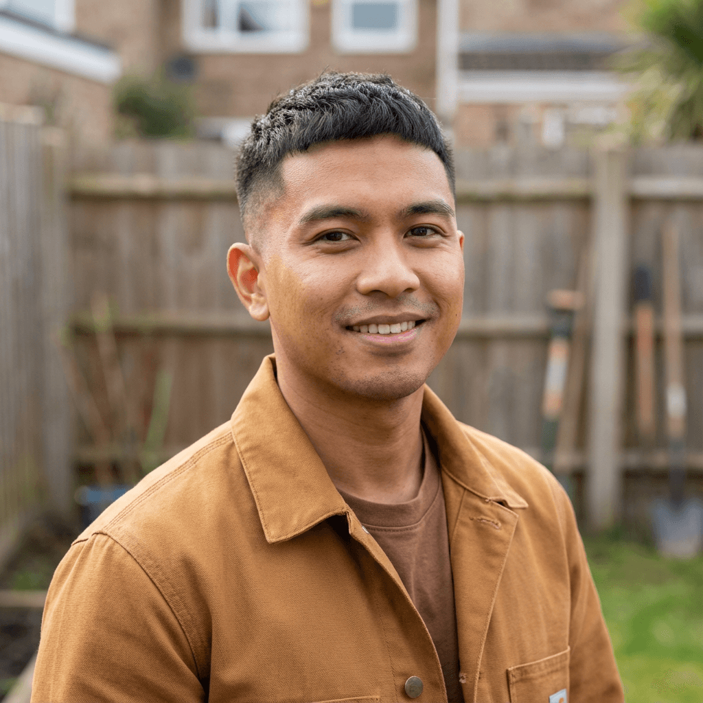 Marcus Chen standing in a clean living room